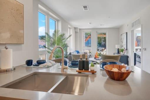 a kitchen with a sink and a window
