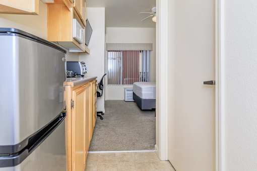 A Kitchen With a Refrigerator at Atrium Garden Apartment Homes, LLC, California, 95112