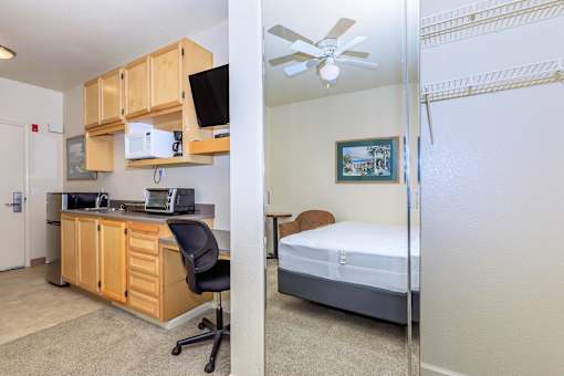 A Bedroom With a Bed at Atrium Garden Apartment Homes, LLC, San Jose, CA, 95112