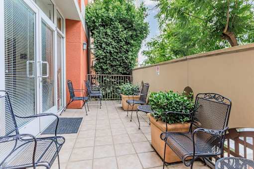 A Patio With a Table at Atrium Garden Apartment Homes, LLC, San Jose, California
