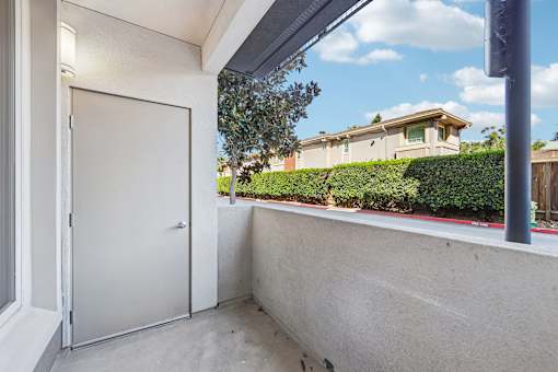 A white door is on the left side of the image.