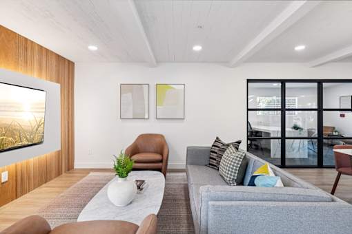 Living area with TV at Ocean Villas Apartments, Oxnard, CA 
