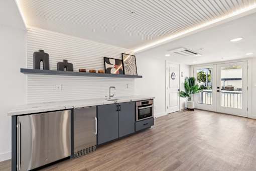 Kitchen with marble countertop at Ocean Villas Apartments, California