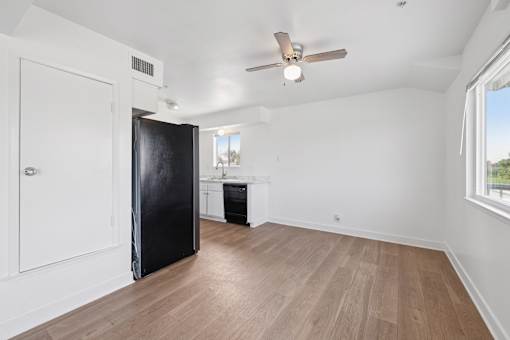 Room with wooden floor at Ocean Villas Apartments, Oxnard, California