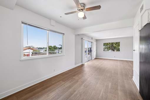 Living room with ceiling fan at Ocean Villas Apartments, Oxnard