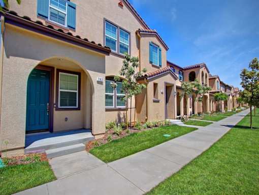 an image of an interesting building with a street in front of it at The Vines at Riverpark, LLC, Oxnard, 93036
