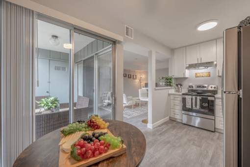 a kitchen with a table with fruit on it at Danville Park, Danville