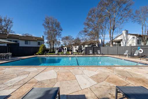 a swimming pool with a house in the background at Diablo Vista, Livermore, California