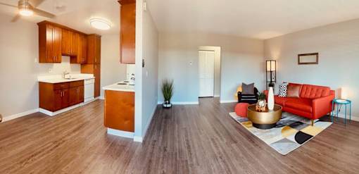 a living room with a couch and a kitchen at Element LLC, Sunnyvale, CA, 94086