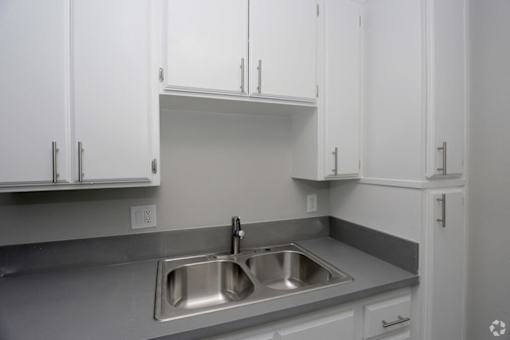 Sink With Faucet at The Marq Apartments LLC, Los Angeles