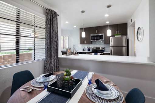a dining room with a table and chairsat The Bryant, Yorba Linda, CA