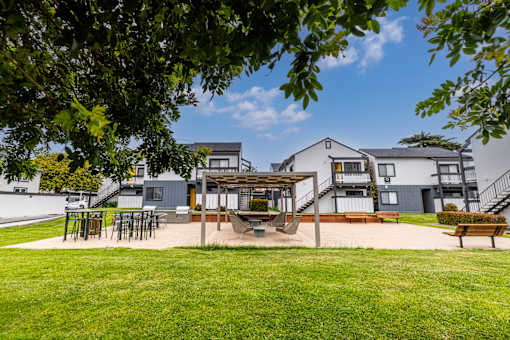 Park with a picnic table and bench at The Gates at the Marina Apartments, California