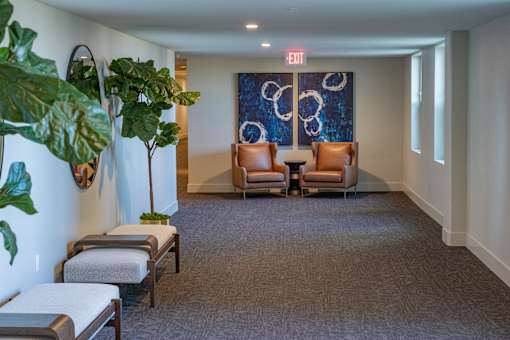 A spacious room with two massage tables and a relaxing atmosphere.