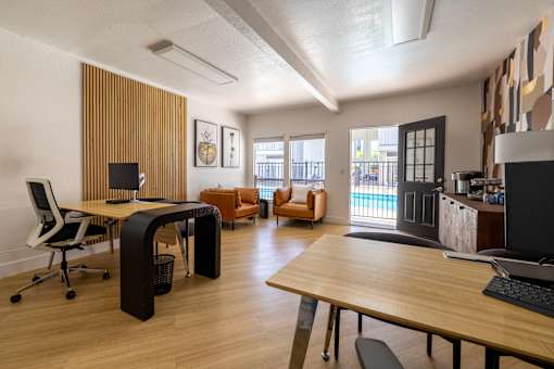 a home office with a desk and a computer on a table at Campbell West Apartments, California 95008