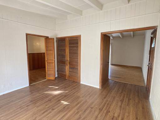 a view of the living room and dining room from the kitchen