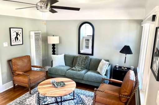 a living room with a couch and a coffee table