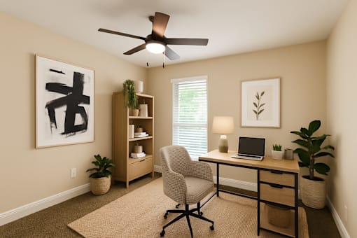 A room with a desk, chair, and a ceiling fan.