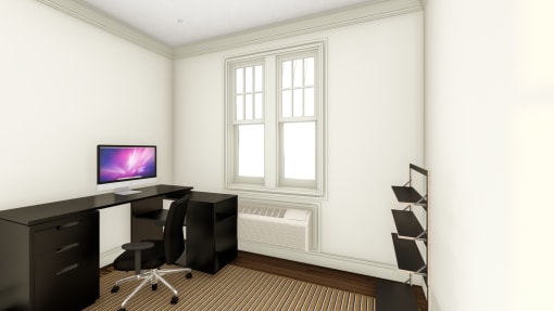 a home office with a computer on a desk and a window