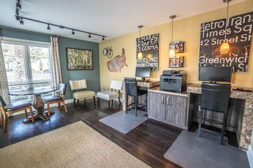 A living room with a flat screen TV and a wooden cabinet.
