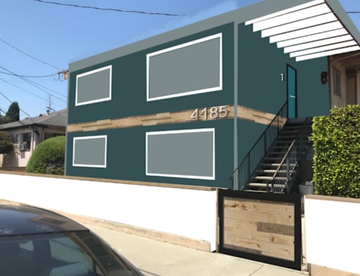 the front of a green house with a car parked in front of it