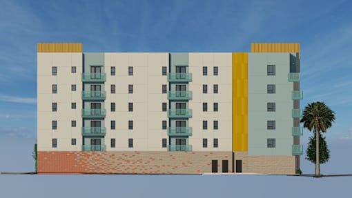 A building with a palm tree in front of it.