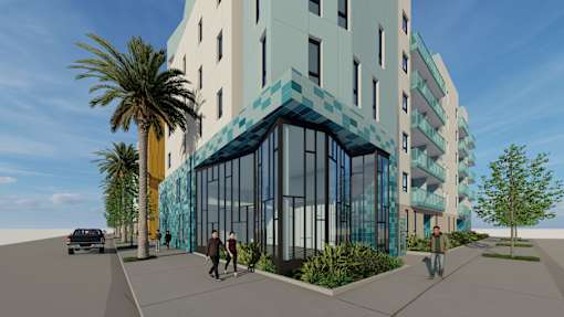 A modern building with a blue glass facade is depicted in the image.