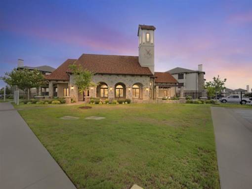 exterior view of property at twilight
