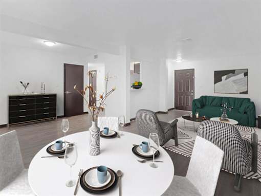 a living room and dining room with a white table and chairs