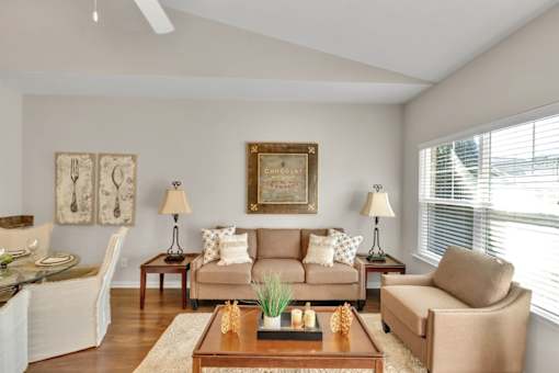 a living room with a couch and a coffee table