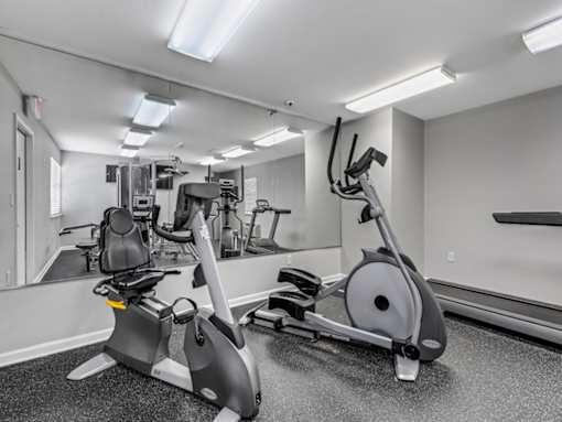 a room filled with lots of chairs in a gym