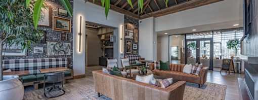 a living room with a couch and a table