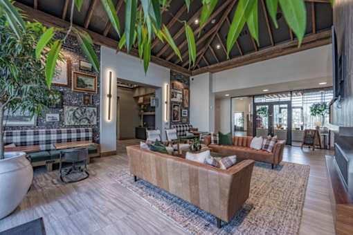 a living room with a couch and a table