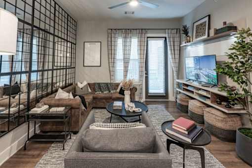 a living room with a couch and a tv