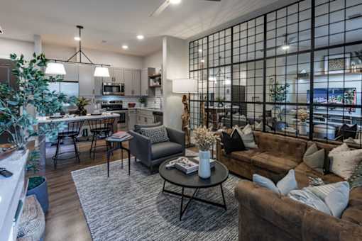 a living room with couches and a table