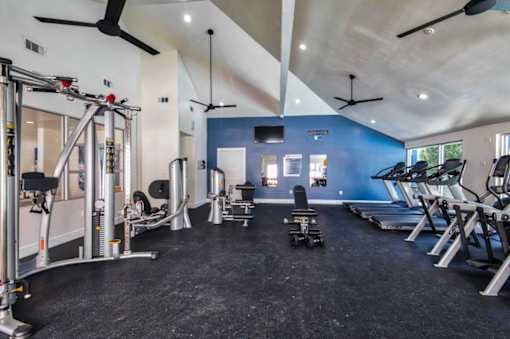 the gym at the flats at big tex apartments