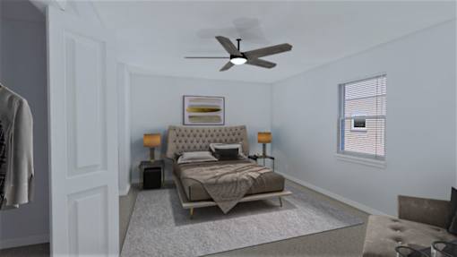 a bedroom with a bed and a ceiling fan