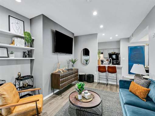 a living room with a couch and a television