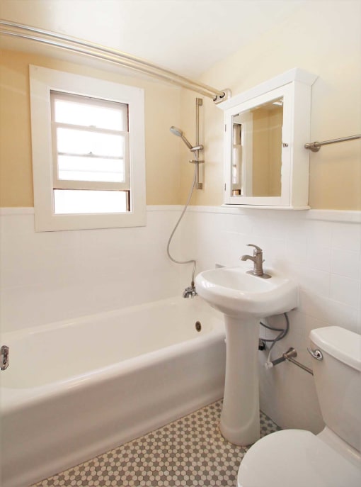 a bathroom with a sink and a bath tub