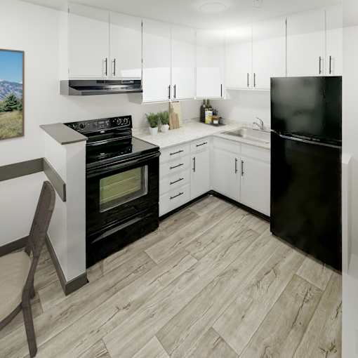 A modern kitchen with black appliances and white cabinets.