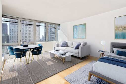 A modern living room with a dining table and a couch.at 'The Metropolis', New York, NY 