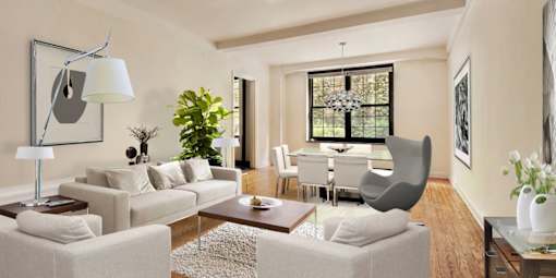 A living room with a grey sofa, a white armchair, a wooden coffee table, and a large window with a view of a garden.at London Terrace Gardens, New York, NY 