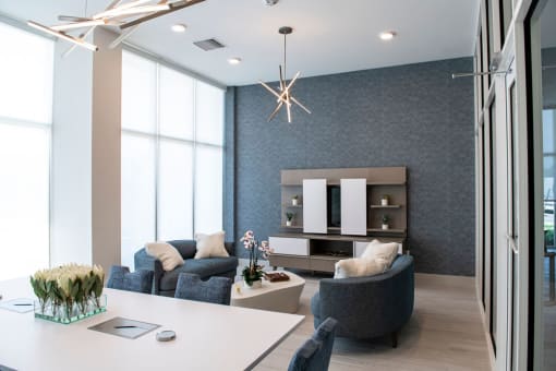 a living room with a couch and a table
