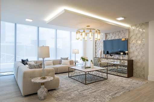 a living room with a couch and a table