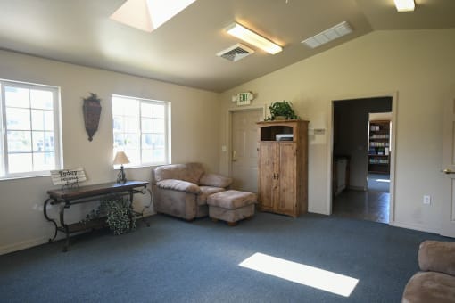 a living room with couches and a table