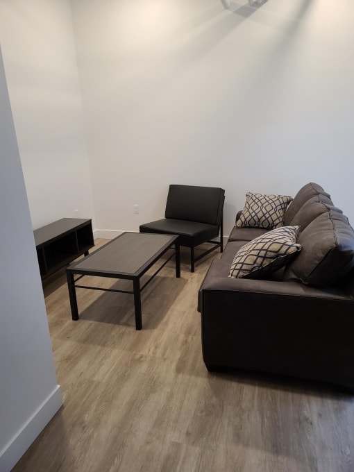 a living room with a couch and a coffee table