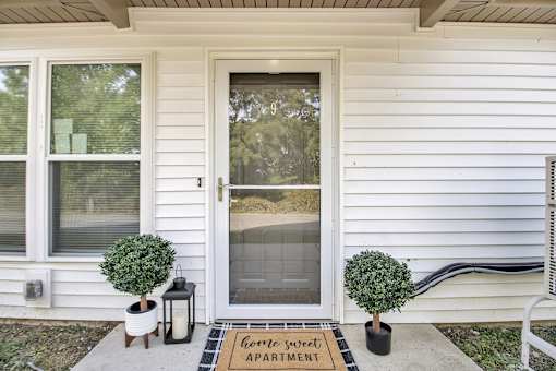 A white house with a glass door