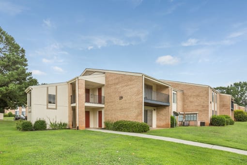 Spacious, landscaped outdoor terrace with lush seating, grills and a fire pit
