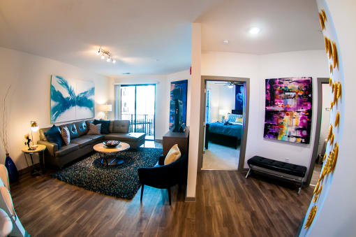 a living room with a couch and a table