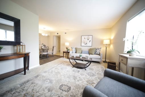 Spacious, landscaped outdoor terrace with lush seating, grills and a fire pit