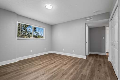 Contemporary Finishes Include Wood And Tile Flooring at Serenity Place Central, Tallahassee, Florida